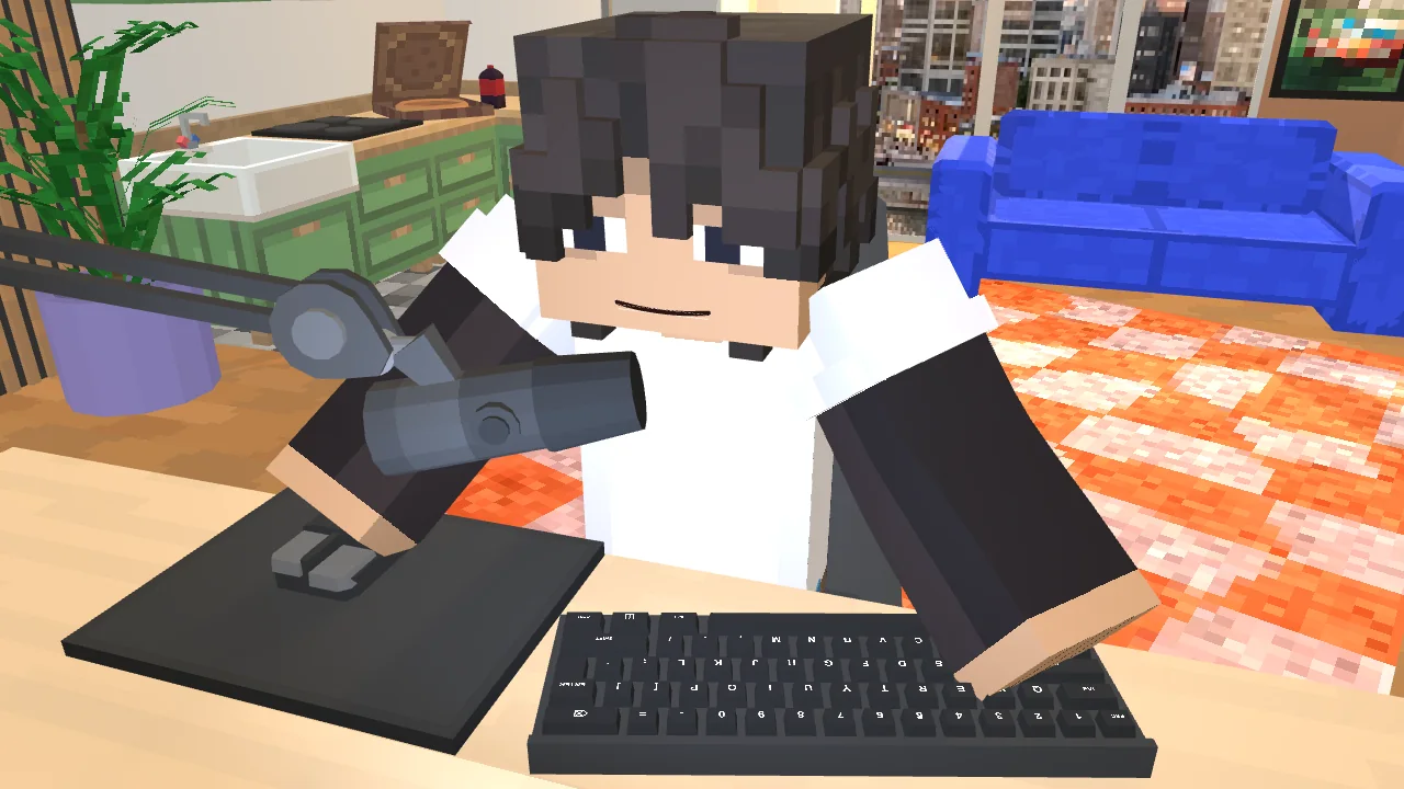 Le personnage, mains sur le clavier et la souris